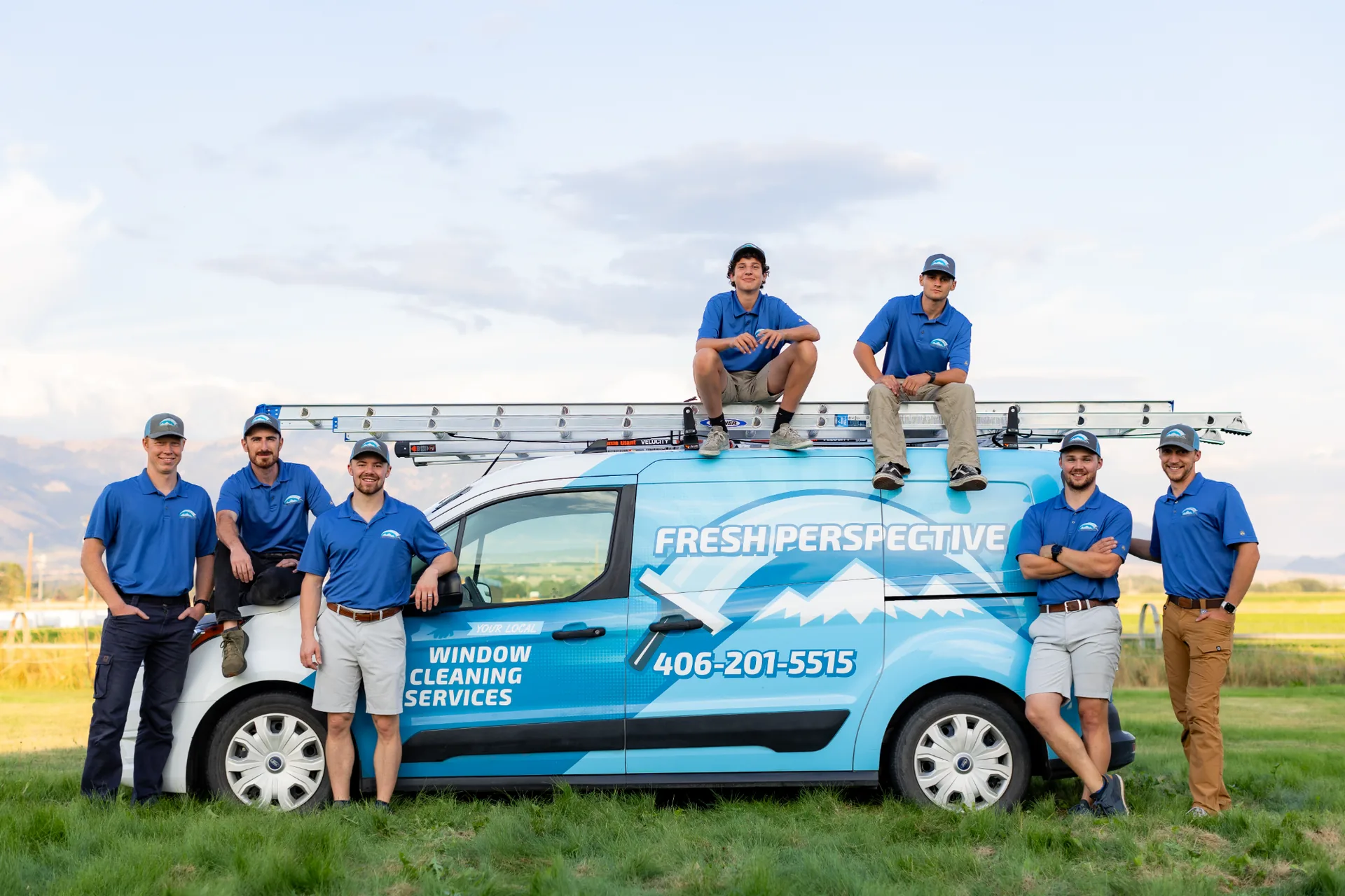 The Fresh Perspective crew with their branded van in the Gallatin Valley